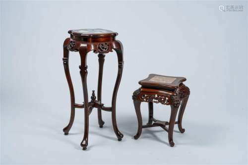 Two Chinese open worked carved wood stands with marble and d...