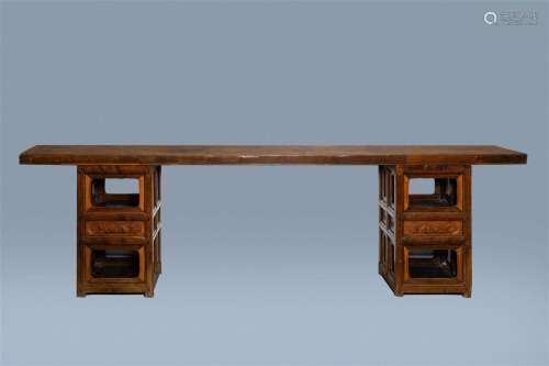 A long Chinese wood console table, 20th C.