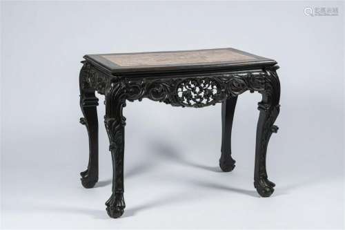 A Chinese open worked hardwood table with marble top, 19th C...