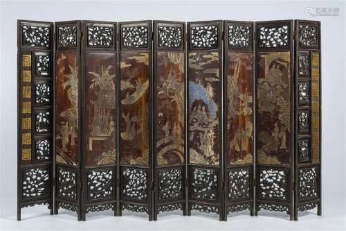 A Chinese nine-panel coromandel lacquer screen with animated...