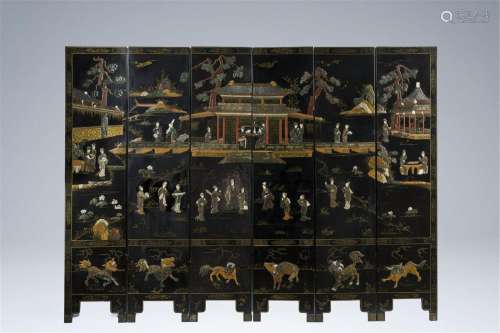 A Chinese six-part folding screen inlaid with bone, mother-o...