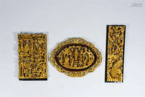 Three Chinese gilt reticulated carved wood panels with birds...