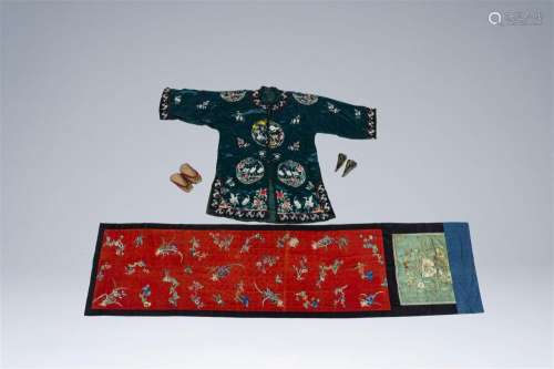A Chinese embroidered silk altar cloth, a jacket with cranes...
