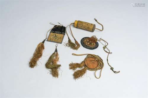 Four Chinese embroidered silk pendants, a.o. scented sachets...
