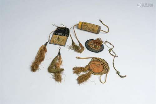 Four Chinese embroidered silk pendants, a.o. scented sachets...