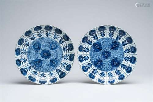 A pair of Chinese blue and white 'aster' dishes, Kangxi