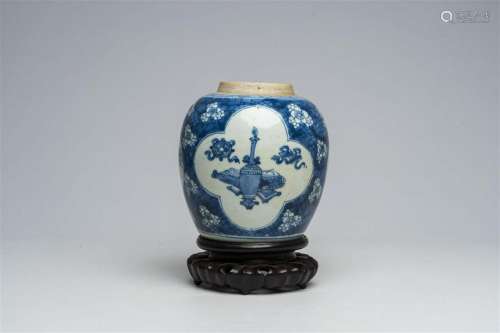 A Chinese blue and white 'antiquities' jar on wood stand, Ka...