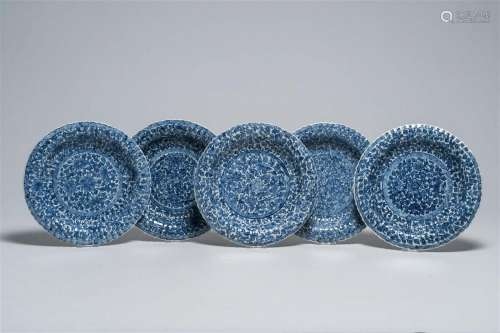 Five Chinese lobed blue and white dishes with floral design,...