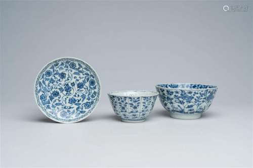 Two Chinese blue and white bowls and a saucer with floral de...