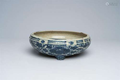 A Chinese Swatow blue and white 'trigrams and flowers' tripo...