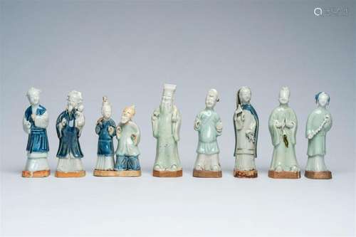 Eight Chinese blue, white and celadon glazed figures, Qianlo...