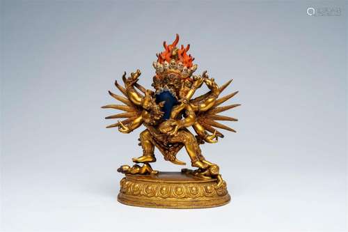 A Sino-Tibetan gilt bronze figure of Mahakala and his consor...