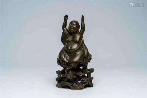 A Vietnamese bronze figure of Buddha seated on a rock, 19th ...