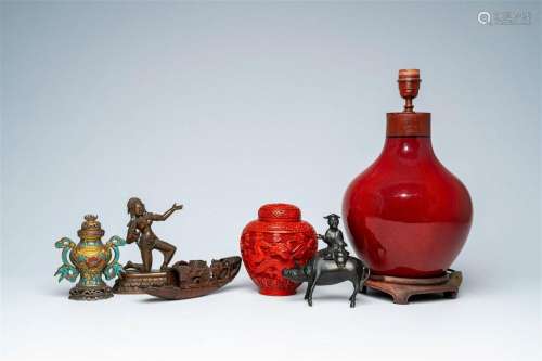 A varied collection of Asian bronze, wood, lacquer and porce...