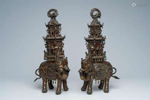 A pair of large Japanese bronze groups with elephants bearin...