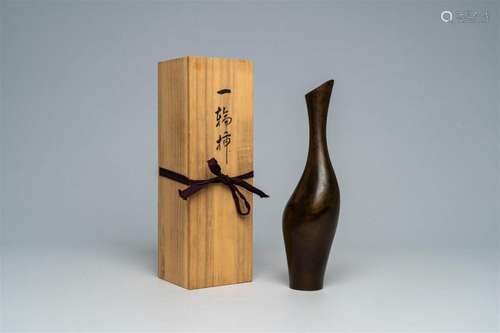 A stylized Japanese bronze crane-shaped vase with brown marb...