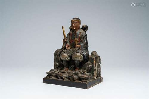 A Japanese polychrome wood okimono of a Yamabushi of ascetic...