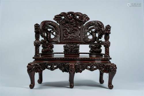 A Japanese carved wood 'dragons and elephants' bench, Meiji,...
