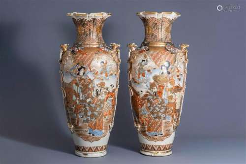 A pair of massive Japanese Satsuma vases with figural design...