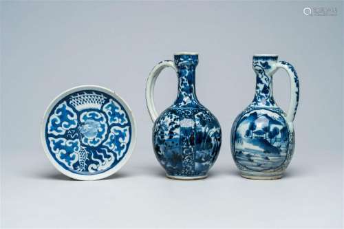 Two Japanese blue and white Arita jugs and a Chinese blue an...