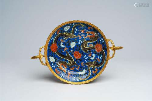 A Chinese blue ground 'dragon' plate mounted as a tazza with...