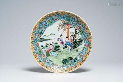 A Chinese famille rose charger with ladies relaxing in a gar...