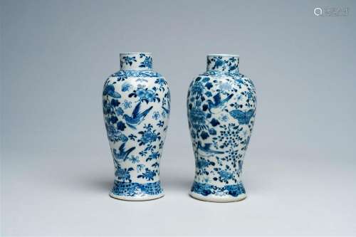 Two Chinese blue and white vases with birds and butterflies ...