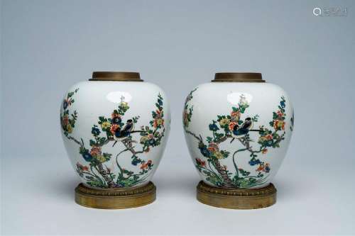 A pair of Chinese bronze and brass mounted famille verte gin...