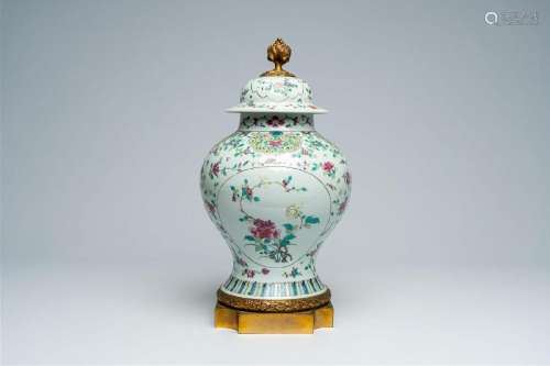 A Chinese famille rose bronze mounted vase and cover with fl...