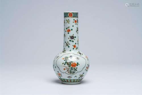A Chinese famille verte vase with floral design, 19th C.