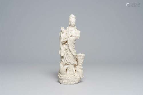 A Chinese Dehua blanc de Chine figure of Guanyin standing on...