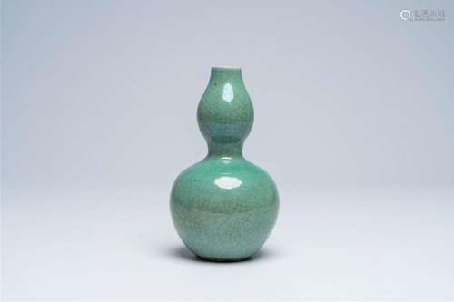 A Chinese crackle glazed celadon double gourd vase, 19th C.