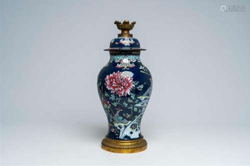 A Chinese famille rose blue ground vase mounted as a lamp, 1...