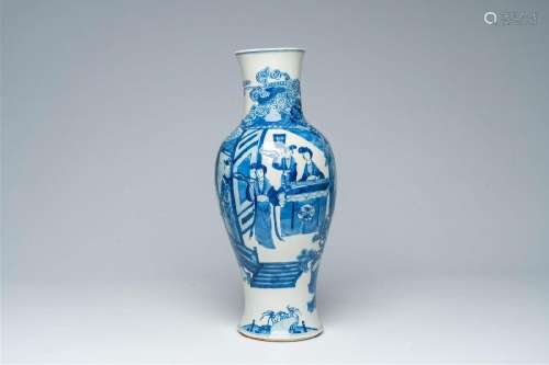 A Chinese baluster shaped blue and white vase with a court s...