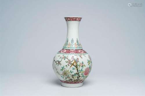 A Chinese famille rose vase with pheasants among blossoming ...