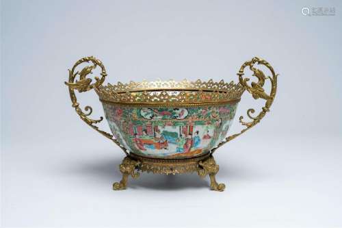 A Chinese Canton famille rose brass mounted bowl with palace...