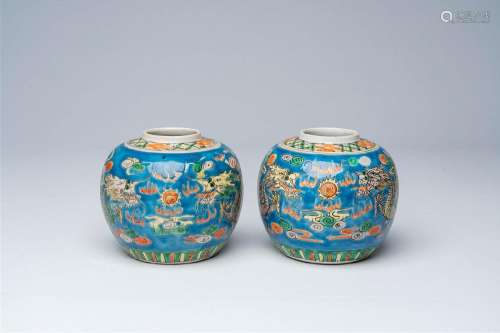 A pair of Chinese blue ground famille verte 'dragons chasing...