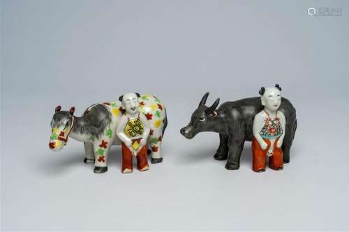 Two Chinese porcelain groups with a buffalo and a donkey wit...