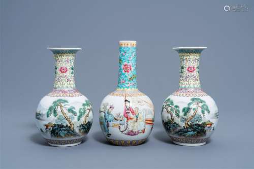 A pair of Chinese bottle shaped famille rose vases with an a...