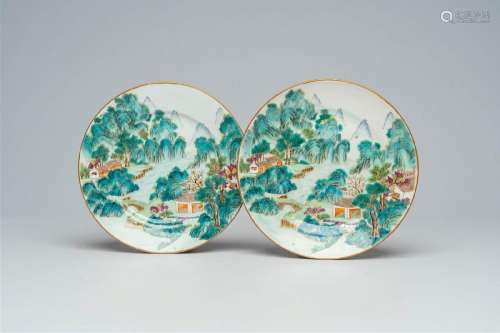 A pair of Chinese famille rose plates with a river landscape...