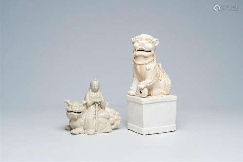 A Chinese blanc de Chine model of a lion and a Japanese whit...