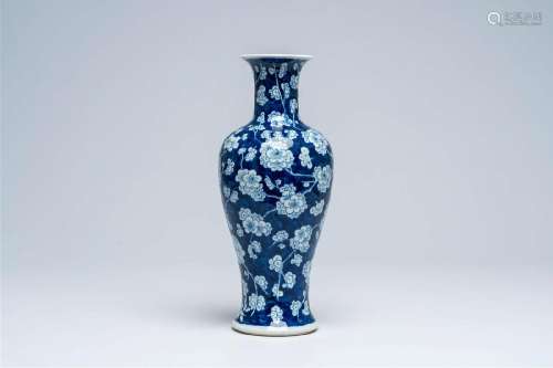 A Chinese blue and white prunus on cracked ice ground vase, ...