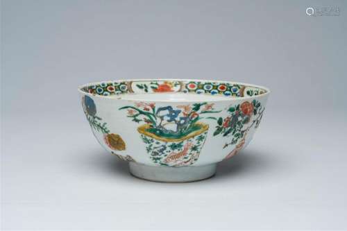 A Chinese famille verte bowl with antiquities and floral des...