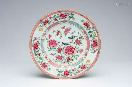 A large Chinese famille rose plate with birds among blossomi...