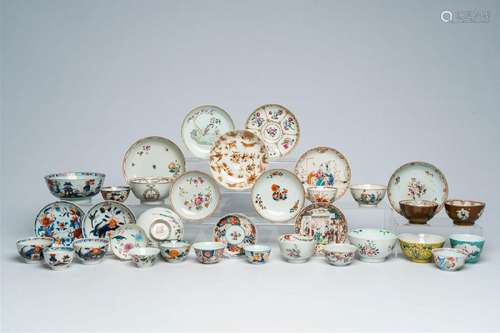 A varied collection of Chinese cups and saucers with various...