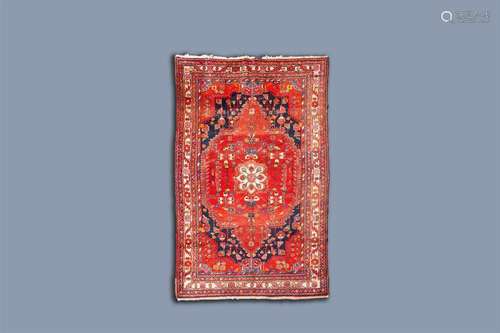 A Persian Hamadan rug with floral design, wool on cotton, fi...