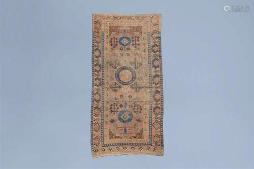 A Khotan rug with geometric design, wool on cotton, East Tur...