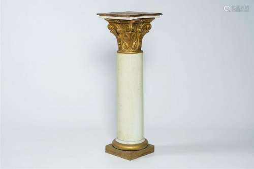 A polychrome and gilt wood pedestal in the form of a column ...