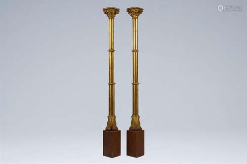 A pair of large Gothic revival gilt wood pillars, 19th C.