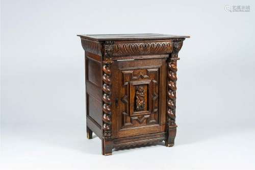 A Flemish oak single-door cupboard composed of Renaissance o...